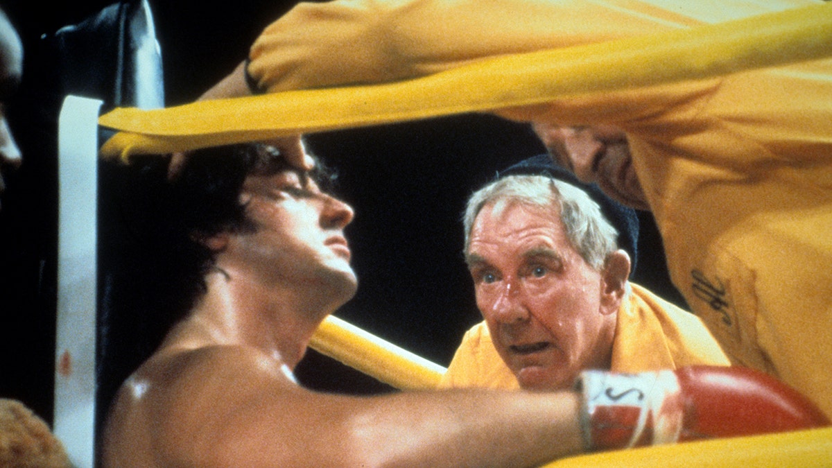 Rocky siiting down in between rounds