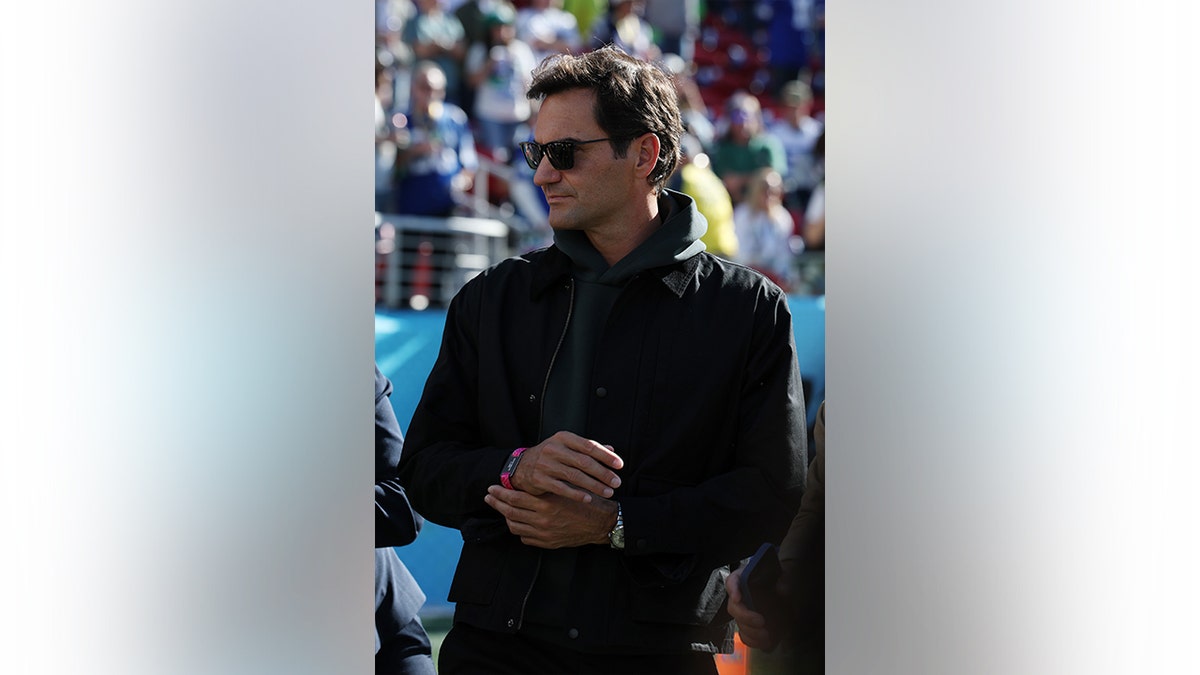 Roger Federer wore black at the Super Bowl.
