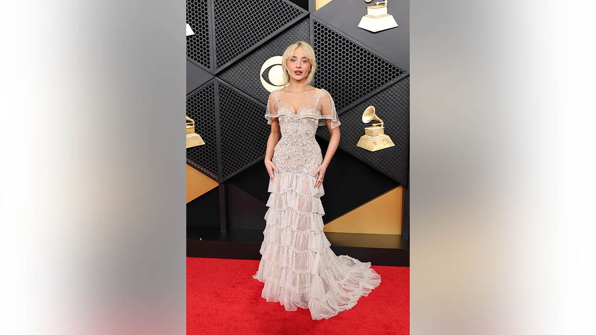 Sabrina Carpenter in white gown at Grammys