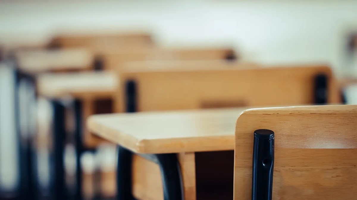 Empty classroom in San Francisco public school with desks and chairs
