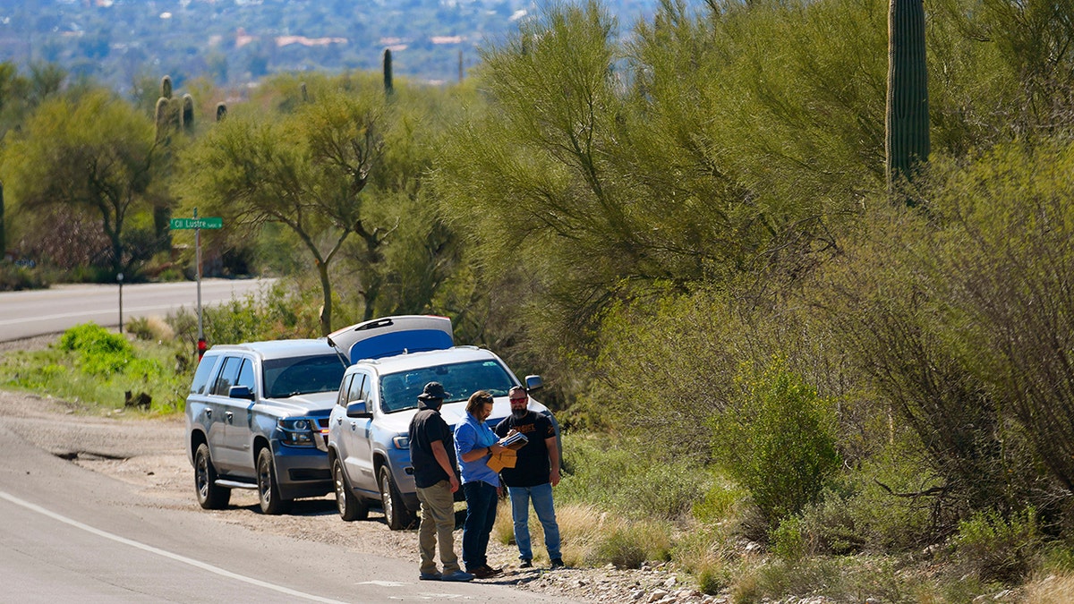 Law enforcement unit   looking adjacent   a roadway extracurricular  Nancy Guthrie's vicinity  successful  Catalina Foothills Tucson