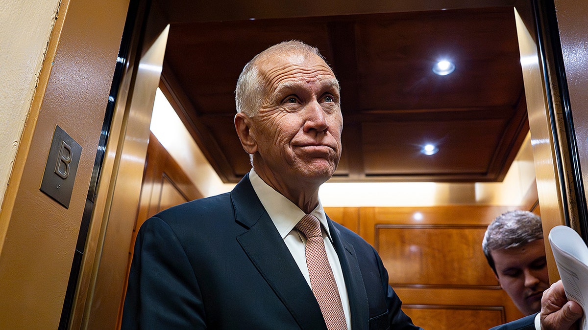Senator Thom Tillis speaking to members of the media while arriving for a vote.