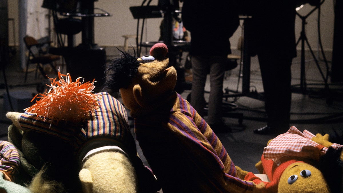 Sesame Street Muppets on the set.