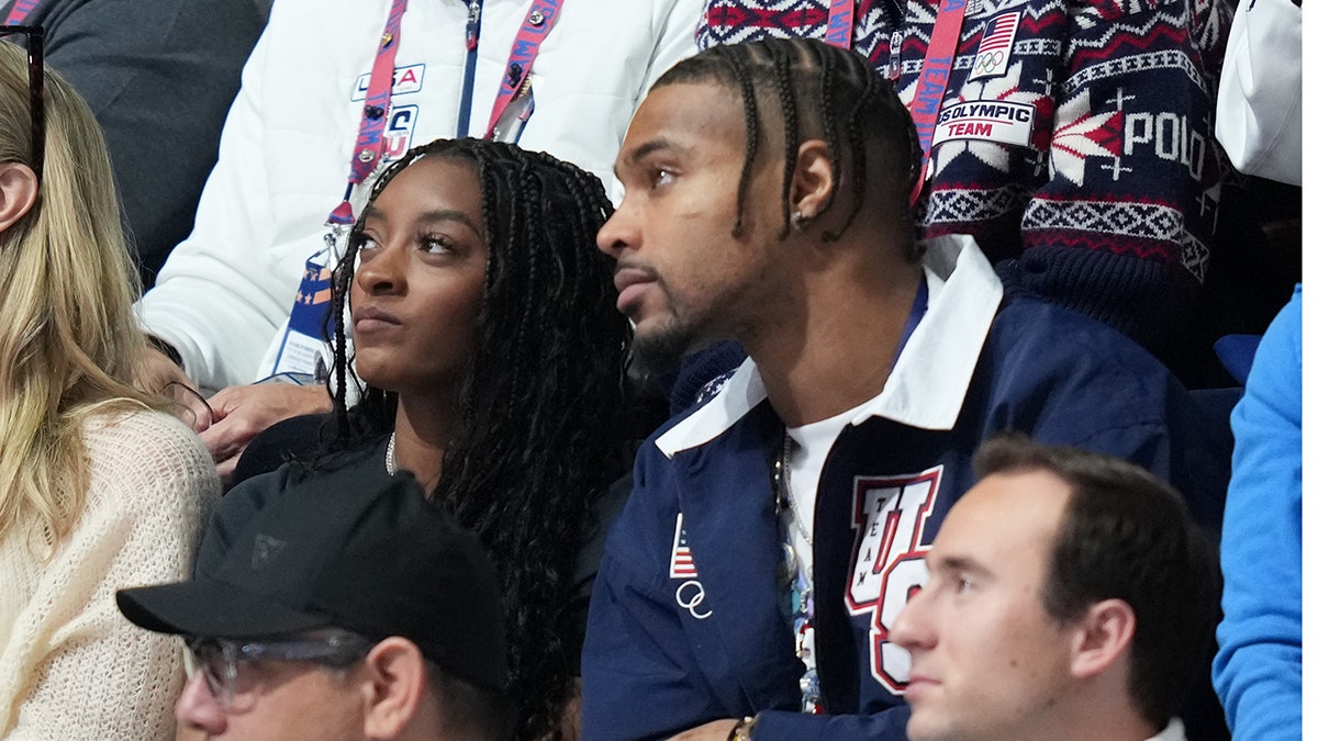 Simone Biles watches the Olympics