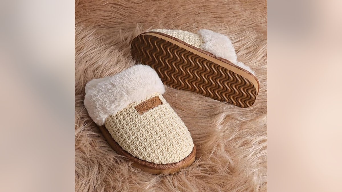 Sherpa-lined slippers she can wear indoors or out.