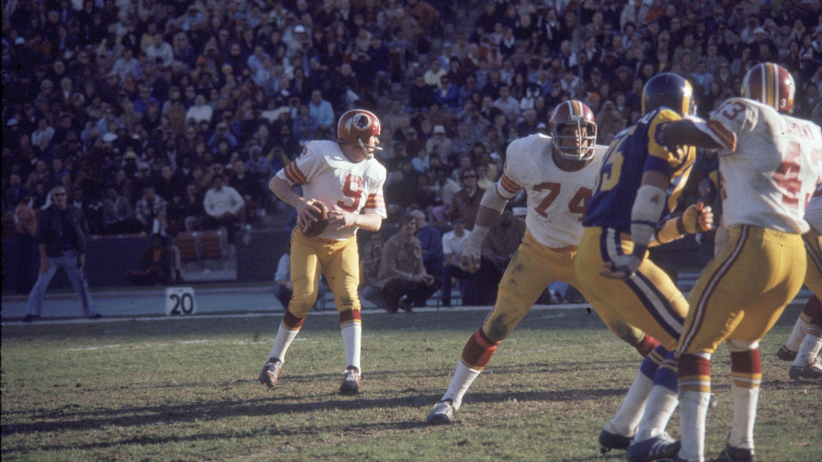 Sonny Jurgensen en acción