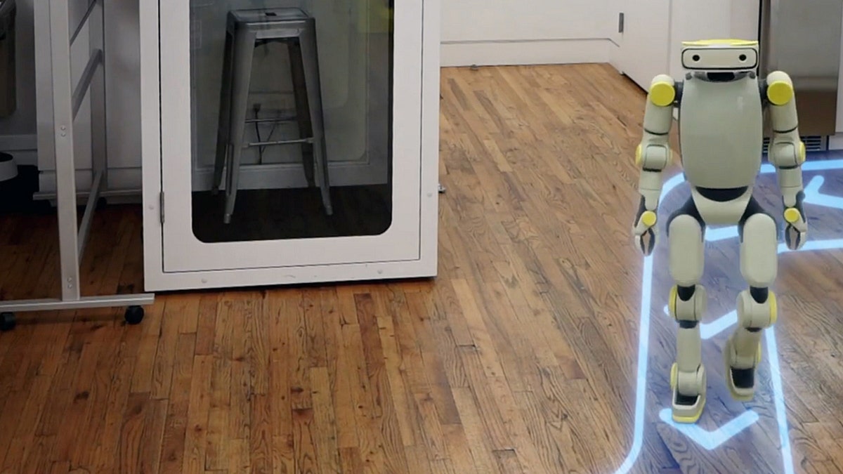 A robot walking through a living room