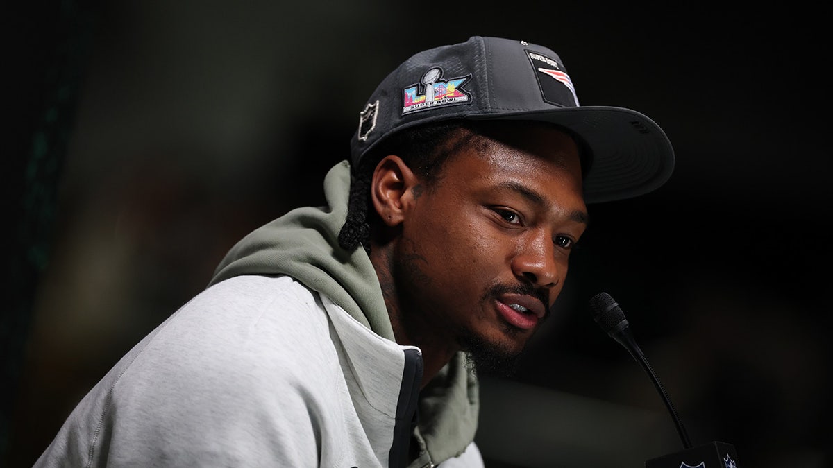 Stefon Diggs looks on during media availability