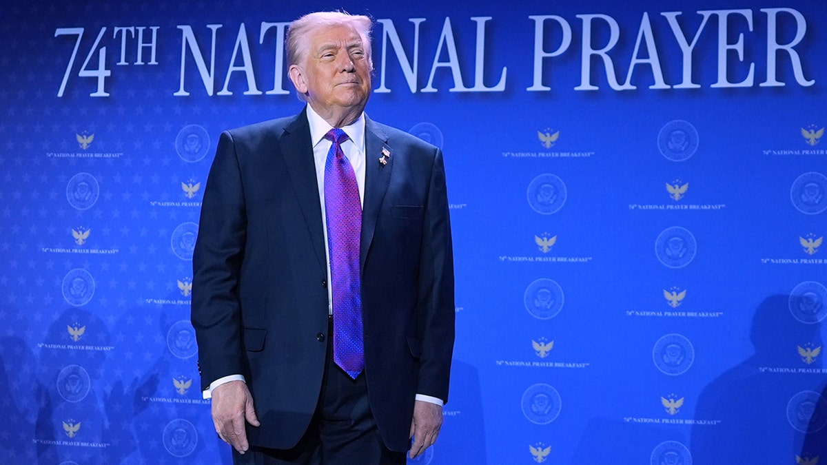 President Donald Trump on stage during an event.