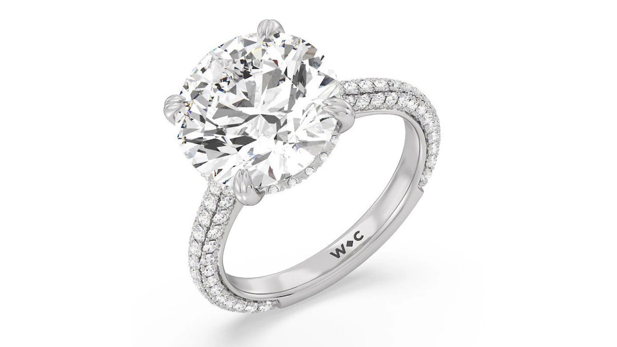 This 10-carat lab-grown engagement ring has a cathedral setting.
