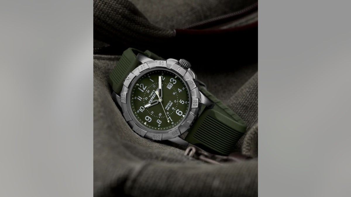 A backlight and large block numerals make the watch easy to read.