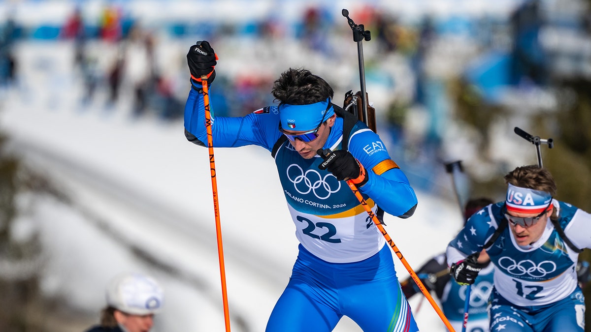 Tommasso Giacomel skiing