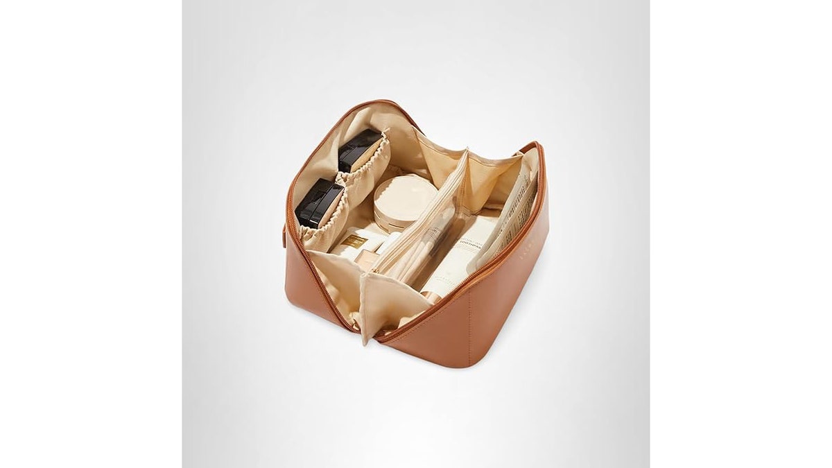 Pack full-size toiletries easily in this smart bag.