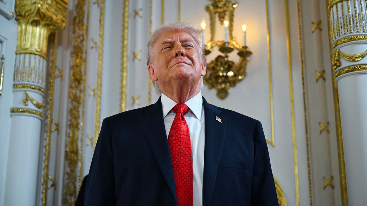 President Donald Trump smiles during a dedication ceremony on January 16, 2026.