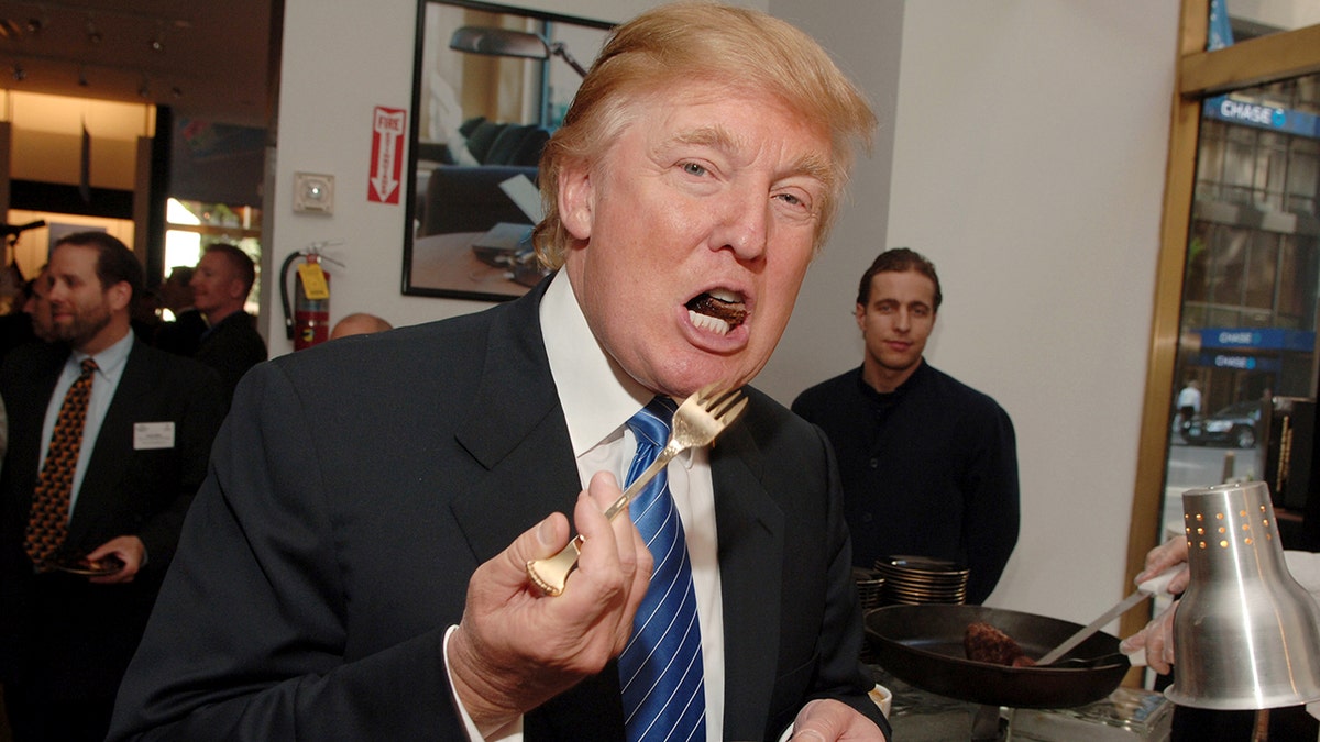 President Donald J. Trump holding a fork.
