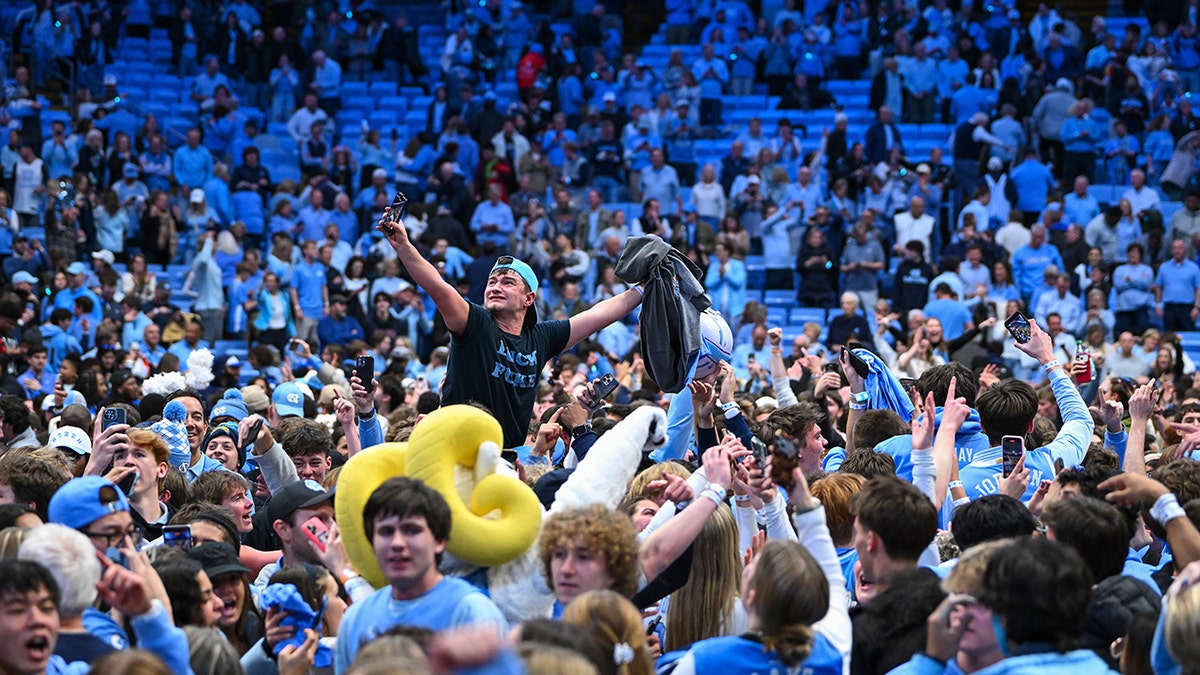UNC fans storm court