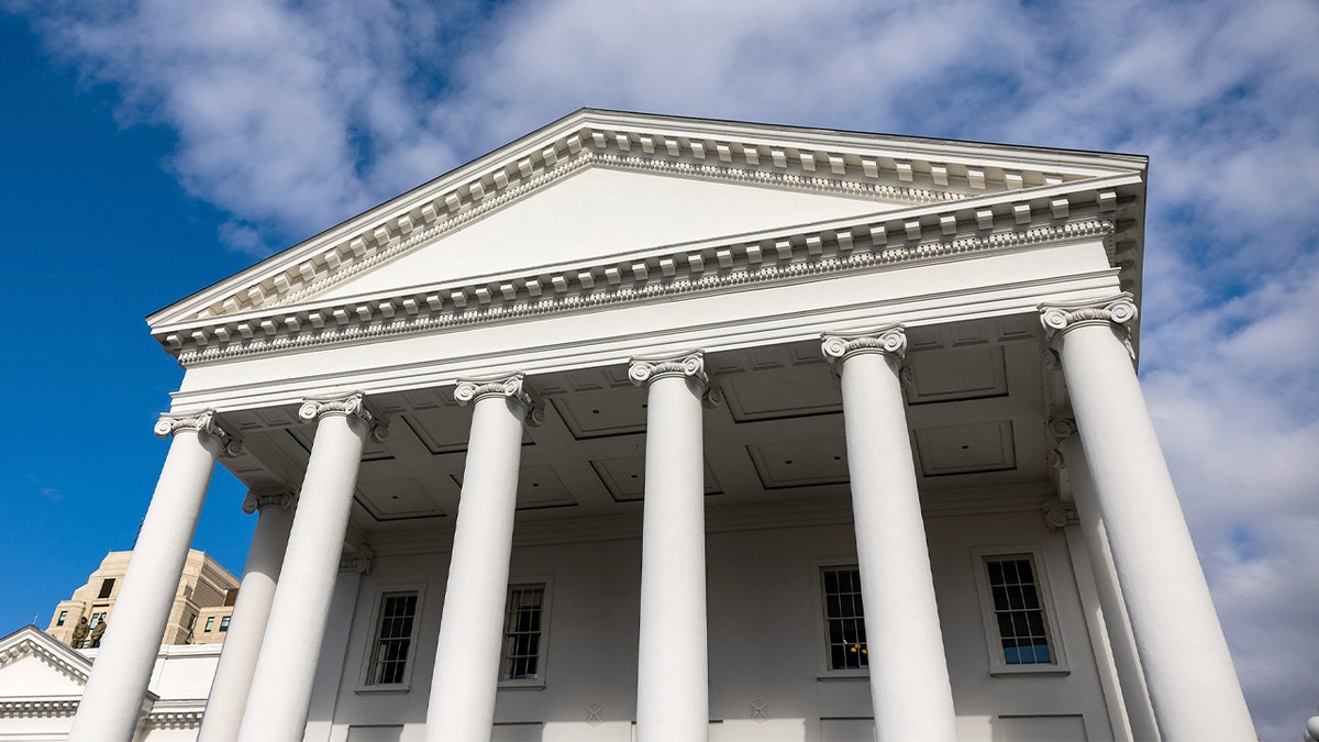 The domed Virginia State Capitol serves as the backdrop for a gubernatorial swearing-in ceremony in Richmond.
