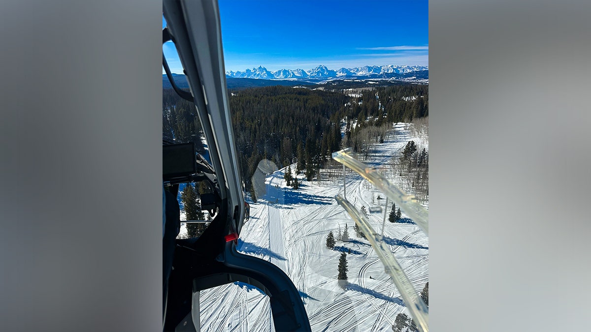 Search and rescue teams are searching for the sled driver.