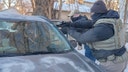 Gun-wielding ICE agents brush back Minneapolis agitators