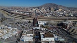 Cars crossing the Paso del Norte International Bridge at the border between Mexico and the United States.