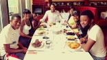 Gianno Caldwell at an early dinner celebrating his little brother Christian's high school graduation.
