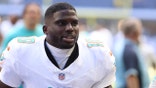 Tyreek Hill runs onto the field