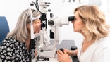 Older woman getting eye exam