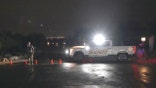 Pima County Sheriff's vehicles blocking a road near Nancy Guthrie's home.