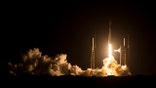 SpaceX rocket launching during the night.