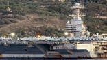 USS Abraham Lincoln aircraft carrier docked at Souda Bay in Crete.