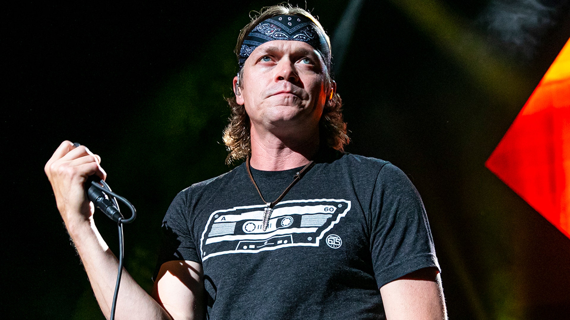 Brad Arnold on stage performing in Michigan in August 2021.
