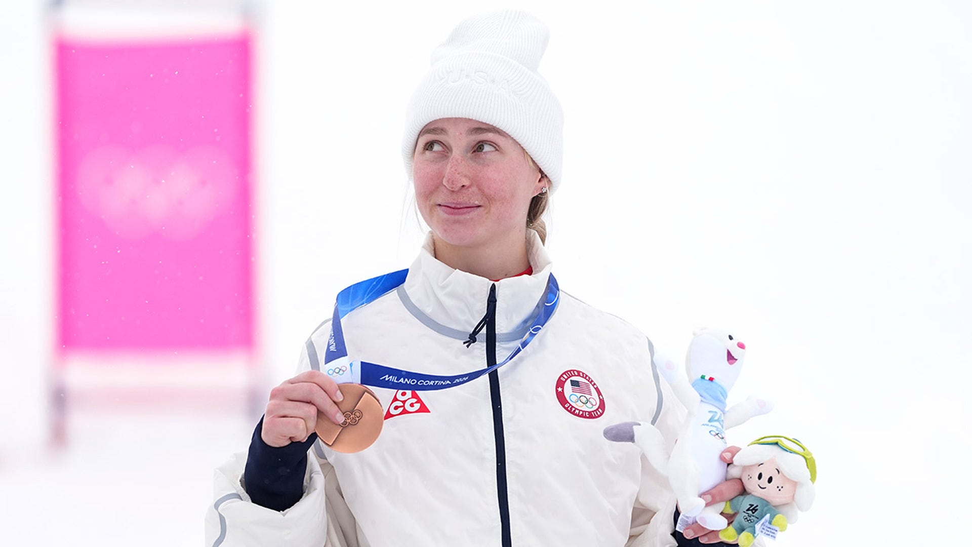 Elizabeth Lemley with a bronze medal