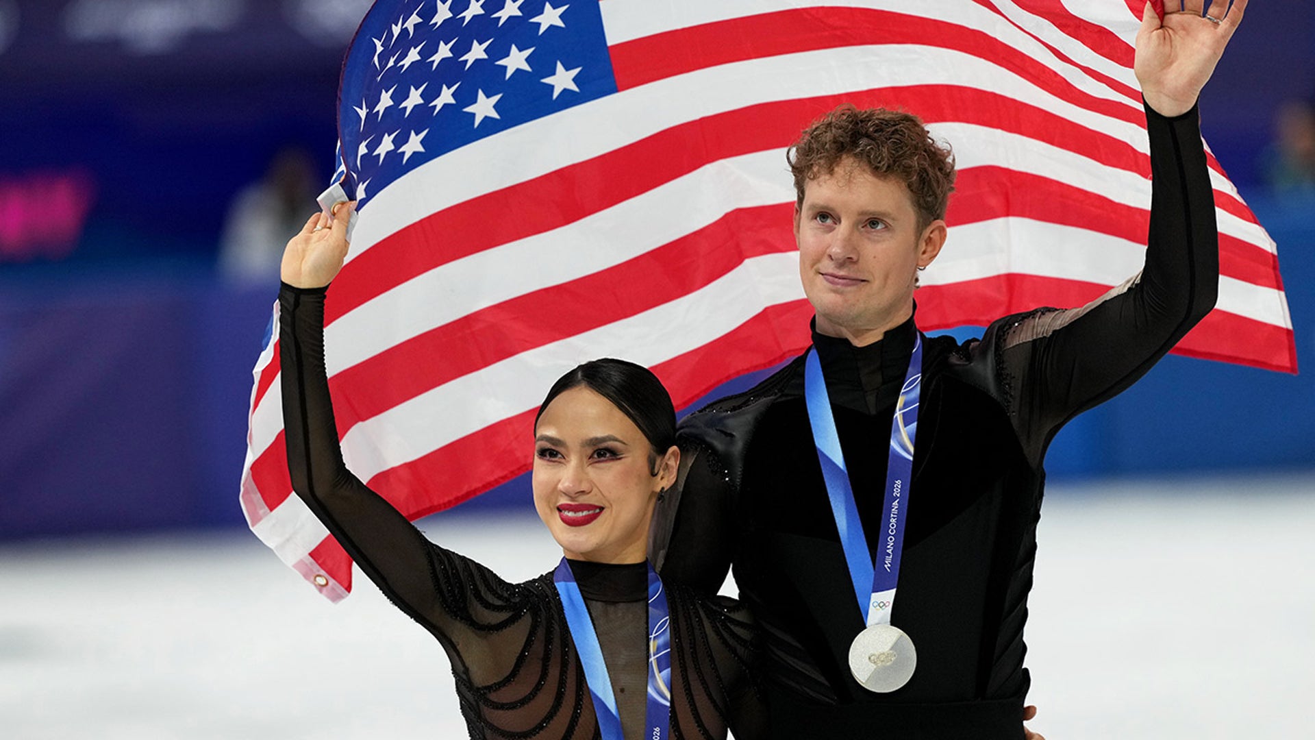 Madison Chock and Evan Bates wave