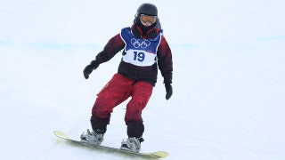 Olympics competition briefly paused after Chinese snowboarder Liu Jiayu is injured in dramatic halfpipe crash