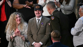 Trump awards Purple Hearts to National Guard members ambushed in Washington, DC: 'We love you all'