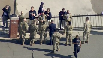 US men's hockey stars share gold medal moment with military members before White House visit - Fox News