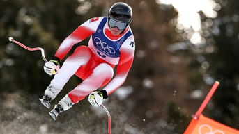 Switzerland claims first gold medal of Milan Cortina Olympics in men’s downhill - Fox News