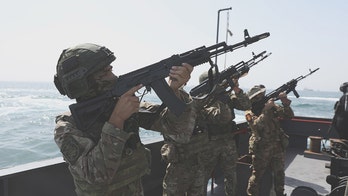 Iran covertly repositions strike drones amid Russia drills in Strait of Hormuz, expert says