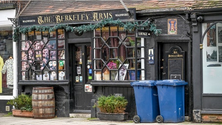 Historic town could fine locals who leave trash bins out too long, ruining visitors' Instagram shots