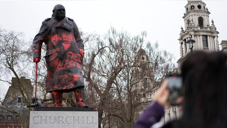 Man arrested after Churchill statue tagged with anti-Israel messages in London