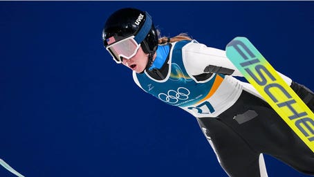 American Olympian disqualified from ski jumping competition over equipment issue