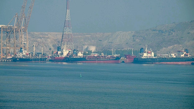 Two oil tankers explode in mined Strait of Hormuz, Iran says