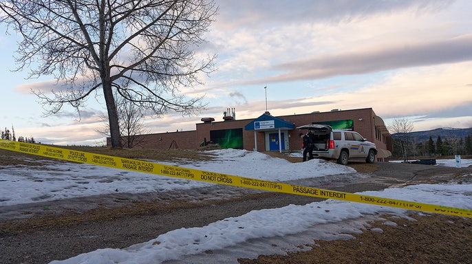 Police tape surrounds the Tumbler Ridge Secondary School and other buildings in Tumbler Ridge, B.C. on Wednesday, Feb. 11, 2026. (Jesse Boily /The Canadian Press via AP)
