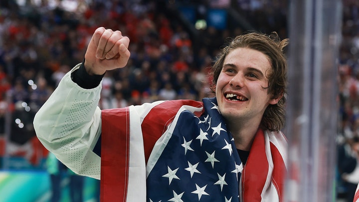 Team USA men's hockey team makes triumphant return to US after winning Olympics gold