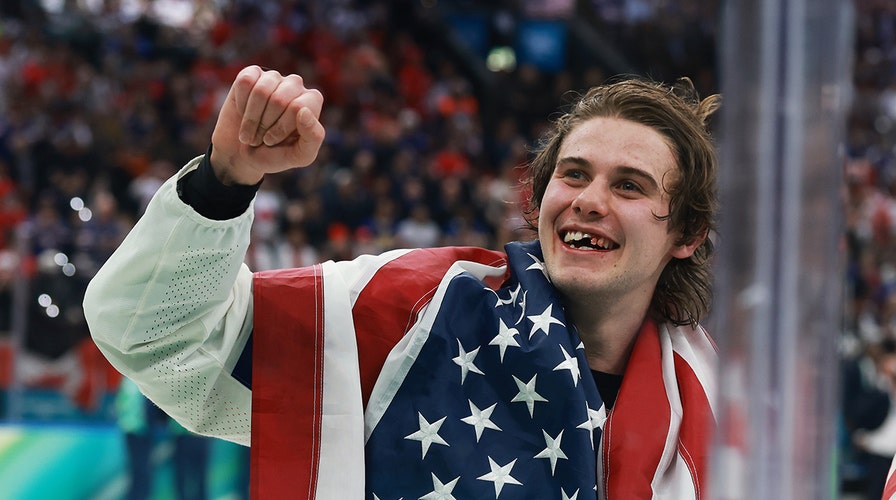 Team USA men's hockey team makes triumphant return to US after winning Olympics gold
