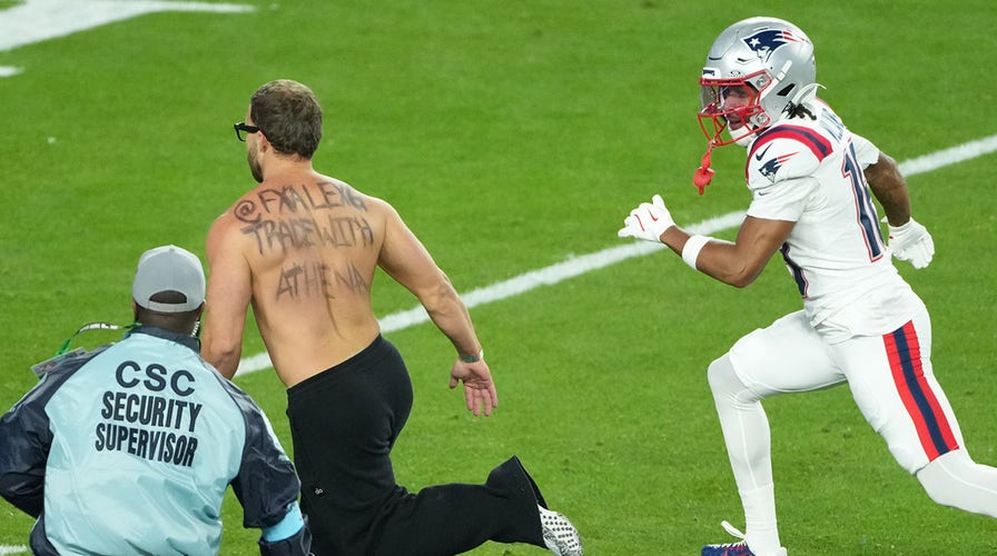 Jon Bon Jovi and Jay-Z greet each other at Super Bowl