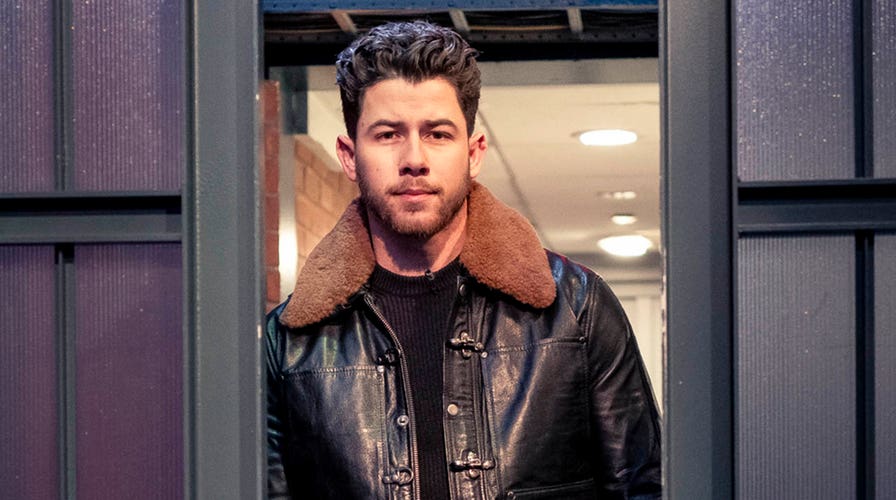 Nick Jonas runs off stage in Prague