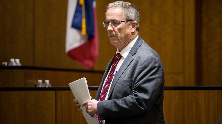 Jeff Gray standing in a courtroom.