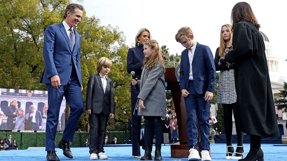 Gov. Gavin Newsom, shown with wife Jennifer Lynn Siebel Newsom and children; Dutch, Brooklynn, Hunter and Montana, before taking the oath of office.