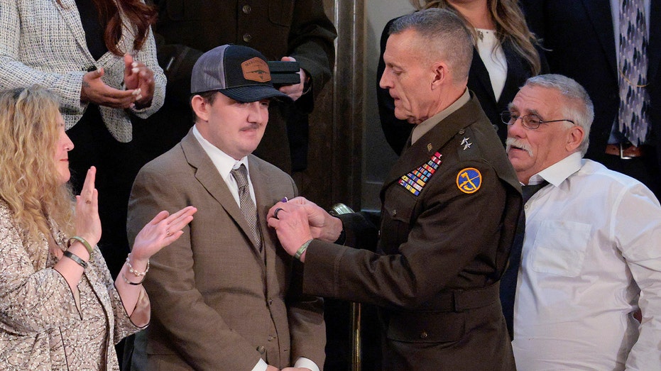 Trump awarding Purple Heart to National Guardsman during State of the Union gets positive marks from voters